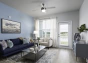 Thumbnail 3 of 29 - an open living room with a blue couch and a coffee table