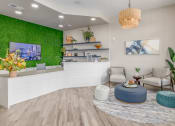 Thumbnail 6 of 20 - Image of the front desk with seating