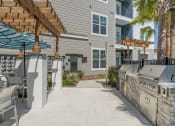 Thumbnail 3 of 20 - Image of the grill area with a pavillion