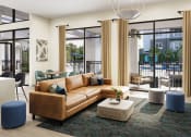 Thumbnail 17 of 30 - a living room with a leather couch and a coffee table