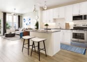Thumbnail 1 of 30 - a kitchen and living room with white cabinets and a counter top