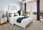 Thumbnail 4 of 30 - a bedroom with blue and white walls and a bed