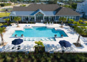 Thumbnail 89 of 92 - an aerial view of the pool at the resort at longboat key club
