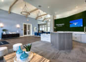 Thumbnail 64 of 92 - a large lobby with a reception desk and a green wall