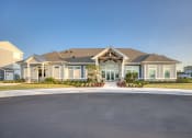 Thumbnail 58 of 92 - a large house with a drive way in front of it