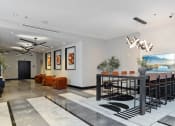 Thumbnail 35 of 50 - the lobby with a table and chairs at The Zenith, Baltimore, MD, 21201