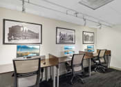 Thumbnail 43 of 50 - a conference room with desks and chairs and pictures on the wall at The Zenith, Baltimore, MD, 21201