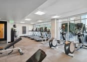 Thumbnail 27 of 50 - a fitness center with machines and weights at The Zenith, Baltimore