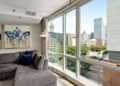 Thumbnail 8 of 50 - Floor to ceiling windows with a city view at The Zenith, Baltimore