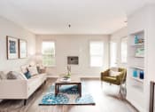 Thumbnail 10 of 28 - a living room with white walls and hardwood flooring at Hamilton at Kings Place, Columbia, MD 21046