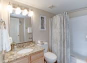 Thumbnail 17 of 33 - a bathroom with a shower toilet and sink at Ellicott Grove, Maryland