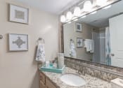 Thumbnail 16 of 33 - a bathroom with a sink and a mirror at Ellicott Grove, Ellicott City, MD 21043