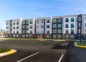 Thumbnail 28 of 35 - Building Exterior at Woodmore Apartments, Bowie, 20706