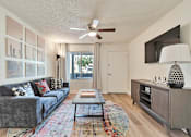 Thumbnail 6 of 33 - Living Room With TV at Riviera Park, Chandler, AZ 85224