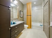 Thumbnail 45 of 84 - Bathroom With Bathtub at Mira Upper Rock, Rockville, MD, 20850
