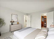 Thumbnail 6 of 33 - a white bedroom with a large bed and a dresser at Ellicott Grove, Ellicott City, MD