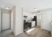 Thumbnail 3 of 27 - Renovated Kitchen at Meadows at Capitol Heights, MD, 20743