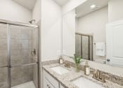 Thumbnail 5 of 30 - a bathroom with two sinks and a shower at Refinery Row, Baltimore, Maryland, 21224