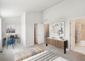 Thumbnail 4 of 30 - a bedroom with a bed and a desk and a mirror at Refinery Row, Baltimore, MD 21224