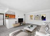 Thumbnail 2 of 40 - Modern living room with wood media console at The Brook At Columbia Apartments, Columbia, MD 21044
