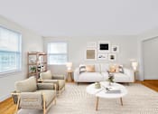 Thumbnail 7 of 28 - Living Room with Couch at Falkland Chase, Silver Spring, Maryland