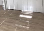 Thumbnail 7 of 10 - Three white cupboards with silver handles are in a room with a light-colored floor.