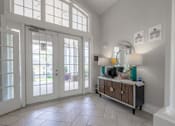 Thumbnail 25 of 48 - A white room with a wooden cabinet and a white pillar at Ellicott Grove, Ellicott City, MD 21043