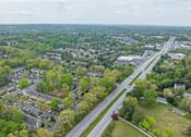Thumbnail 48 of 48 - A bird's eye view of a residential area with a road running through it at Ellicott Grove, Ellicott City, MD 21043