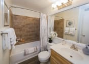 Thumbnail 20 of 35 - a bathroom with a sink toilet and bathtub at Madison at Eden Brook, Columbia, 21046