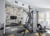 Thumbnail 50 of 56 - A gym with a wall of fitness related words at Madison at Eden Brook, 21046