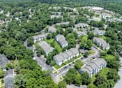 Thumbnail 56 of 56 - A bird's eye view of a residential area with houses and trees at Madison at Eden Brook, 21046