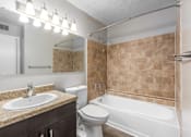 Thumbnail 28 of 56 - A bathroom with a sink, toilet, and bathtub at Madison at Eden Brook, 21046