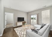 Thumbnail 5 of 34 - Living Room With TV at MetroPlace at Town Center, Camp Springs