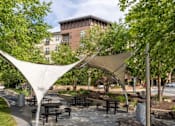 Thumbnail 79 of 84 - A park with a white canopy and picnic tables at Mira Upper Rock, Maryland, 20850