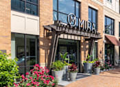 Thumbnail 69 of 84 - The front of a building with a sign that says at Mira Upper Rock, Maryland, 20850