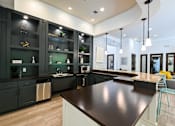 Thumbnail 12 of 24 - A modern kitchen at Poplar Glen Apartments, Maryland.
