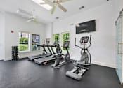 Thumbnail 9 of 24 - A spacious home gym at Poplar Glen Apartments, Columbia, MD, 21044.