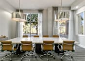 Thumbnail 9 of 24 - A conference room with a long table and chairs at Prairie Crossing, Texas 75244