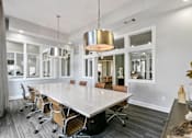 Thumbnail 8 of 24 - A conference room with a long table and chairs at Prairie Crossing, Farmers Branch, TX 75244