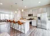 Thumbnail 7 of 30 - Kitchen Island with Bar Stools at Refinery Row, Baltimore Maryland