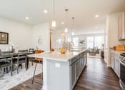 Thumbnail 10 of 30 - Kitchen with Dining Area at Refinery Row, Baltimore, MD