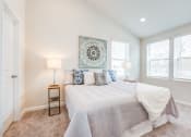 Thumbnail 16 of 30 - Bedroom with a Large Bed at Refinery Row, Baltimore