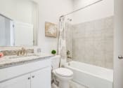 Thumbnail 19 of 30 - Bathroom with Bathtub and Sink at Refinery Row, Baltimore, 21224