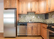 Thumbnail 3 of 22 - Modern Kitchen at Potomac Ridge Apartments, Woodbridge, VA 22191