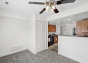 Thumbnail 7 of 40 - Open concept living and dining area with kitchen view at The Brook At Columbia Apartments, Columbia, MD