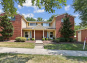Thumbnail 2 of 54 - a brick house with a sidewalk in front of it at Villages at Morgan Metro, Landover, Maryland, 20785