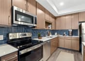 Thumbnail 1 of 35 - Fully Equipped Kitchen at Woodmore Apartments, Bowie, 20706