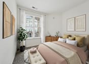 Thumbnail 8 of 49 - A bedroom with a large bed and a window with blinds.