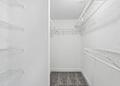 Thumbnail 15 of 40 - Walk-in closet with wire shelving systems at The Brook At Columbia Apartments, Columbia