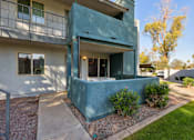 Thumbnail 21 of 33 - A blue house with a white wall and a window at Riviera Park, Chandler Arizona